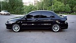 Диски OZ Racing Ultraleggera на автомобиле Mitsubishi Lancer Диски OZ Racing Ultraleggera на автомобиле Mitsubishi Lancer