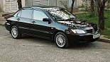 Диски Racing Wheels Classic H-155 на автомобиле Mitsubishi Lancer Диски Racing Wheels Classic H-155 на автомобиле Mitsubishi Lancer