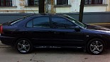 Диски Racing Wheels Premium H-337 на автомобиле Mitsubishi Carisma Диски Racing Wheels Premium H-337 на автомобиле Mitsubishi Carisma