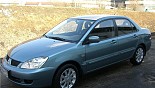 Диски Mitsubishi MI7 на автомобиле Mitsubishi Lancer Диски Mitsubishi MI7 на автомобиле Mitsubishi Lancer