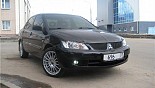 Диски OZ Racing Superturismo GT на автомобиле Mitsubishi Lancer Диски OZ Racing Superturismo GT на автомобиле Mitsubishi Lancer