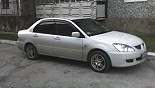 Диски Racing Wheels Classic H-109 на автомобиле Mitsubishi Lancer Диски Racing Wheels Classic H-109 на автомобиле Mitsubishi Lancer