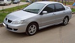 Диски Mitsubishi MI6 на автомобиле Mitsubishi Lancer Диски Mitsubishi MI6 на автомобиле Mitsubishi Lancer